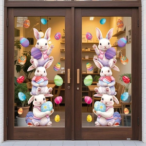 Easter window stickers featuring stacked bunnies holding colorful eggs for glass decor