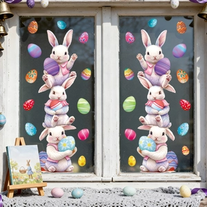 Easter window clings featuring stacked rabbits holding eggs on glass pane decoration