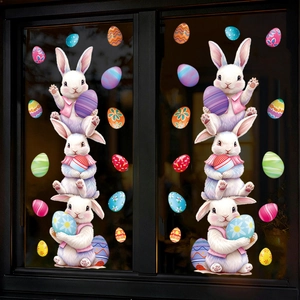 Detailed view of white Easter bunnies and colorful eggs on static window cling