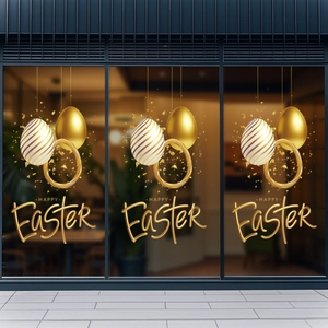 Three-piece gold Happy Easter static stickers applied on shop window glass display