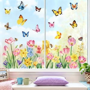 Close-up of double-sided spring window stickers with realistic floral and butterfly designs