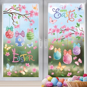 Detailed view of Easter window stickers with cherry blossoms, colorful eggs and butterflies