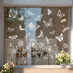 White butterfly flower static cling decals displayed on a bright window for home decoration