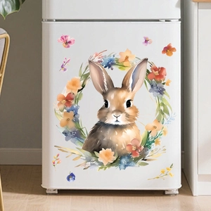 Detailed watercolor Easter bunny and floral wreath sticker on a white refrigerator door