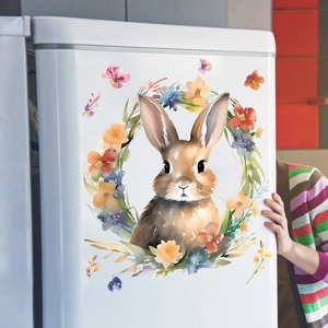 Detail of Easter watercolor bunny and floral wreath sticker on a white refrigerator