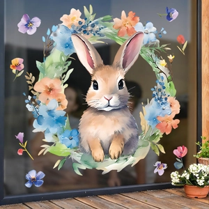 Detailed watercolor Easter bunny floral wreath sticker applied to a clear glass window