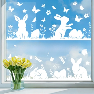 Easter white bunny window stickers with butterflies and floral motifs on a glass surface