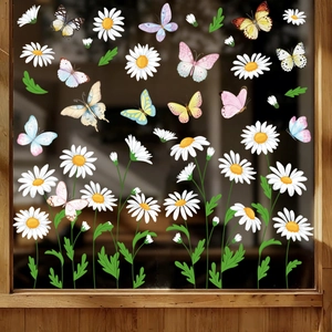 Spring butterfly and white daisy floral static window stickers on a glass pane