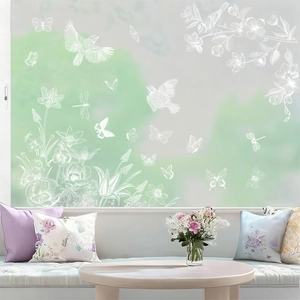 Spring static window clings with white flower, butterfly, and bird motifs for home decor