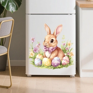 Détail d'autocollant lapin de Pâques et œufs colorés sur un réfrigérateur blanc