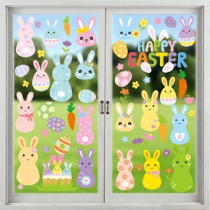 Detailed view of colorful Happy Easter window clings with cute rabbits and eggs