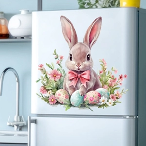 Detailed view of watercolor bunny and Easter egg static stickers on a white refrigerator