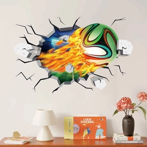 3D realistic wall sticker featuring a flaming soccer ball bursting through a cracked wall