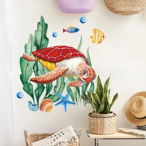 Detailed watercolor sea turtle and coral wall decals in a warm home interior setting