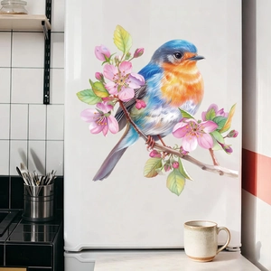 Watercolor bird and flower window sticker applied on a modern white refrigerator surface