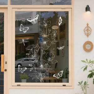 Weiße Blumen- und Schmetterling-Glasaufkleber für die Frühlingsdekoration am Fenster