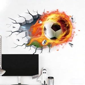 3D wall sticker showing a flaming soccer ball breaking through a wall with stadium view