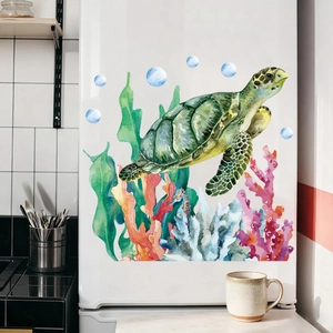 Green sea turtle and coral watercolor wall stickers applied on a white refrigerator