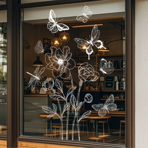 White floral glass window decals featuring delicate butterflies and dragonflies in cafe