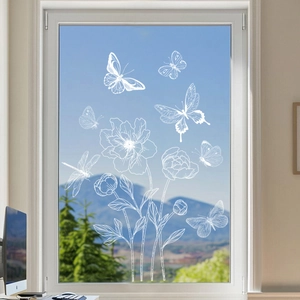 White flower and butterfly static window film with nature view on window glass