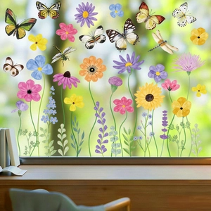 Watercolor floral and butterfly static window clings showing light on glass