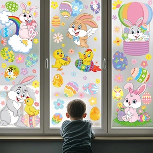 Easter window clings showing colorful rabbits and eggs applied on glass surface
