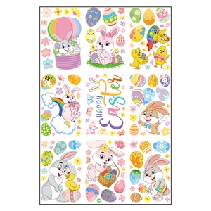 Colorful Easter window clings set with cartoon bunnies, rainbow eggs and Happy Easter text