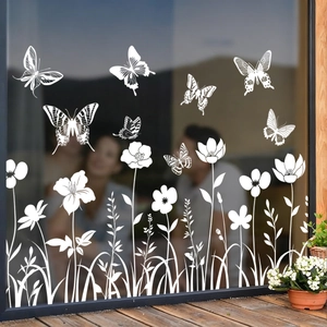 Detaillierte weiße Silhouetten-Sticker mit Schmetterlingen und Blumen auf Fensterglas