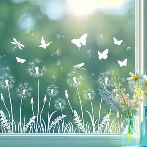 White dandelion and butterfly static window clings on glass with garden background