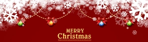 Close-up of Merry Christmas banner with colorful ornaments and festive snow details