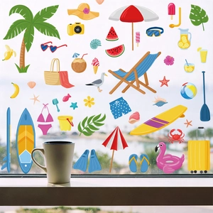 Detailed view of summer beach window stickers with palm trees and flamingos on glass
