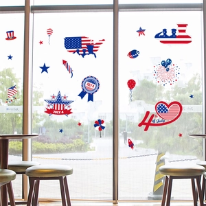 Patriotic July 4th window stickers with American flags and maps on glass window