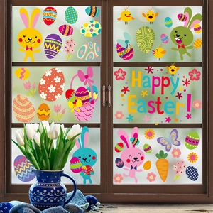 Vibrant Easter window stickers featuring bunnies and eggs on frosted glass with tulips