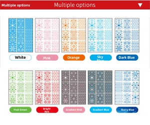 Macro shot of 10 colorful snowflake static window stickers in various festive patterns