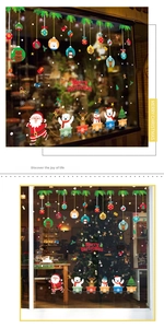 Detail of Santa Claus and reindeer train window stickers for festive glass decoration