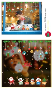 Detail of Santa Claus train window stickers and colorful Merry Christmas ornaments
