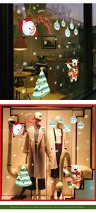 Detail of Santa Claus and reindeer window decals for Christmas festive glass decoration