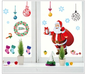 Detail of Santa Claus and Merry Christmas wreath PVC window stickers for holiday decor
