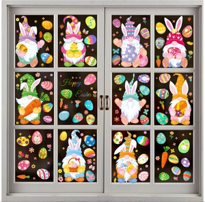 Detail of Happy Easter window clings featuring cartoon gnomes, colorful eggs and carrots