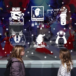 White Christmas window stickers featuring Santa Claus, reindeer and snowman decals