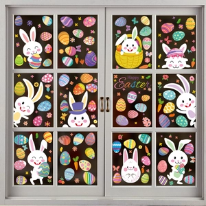 Easter window decals featuring colorful cartoon rabbits and patterned eggs on glass