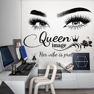 Detail of black vinyl wall sticker with crown, eyelashes and Queen Her Vibe text
