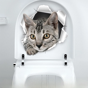 3D hole-effect cat toilet sticker with tabby cat design measuring 23cm by 19cm
