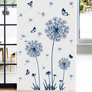 Detail of deep blue dandelion wall stickers with flying butterflies on white wall