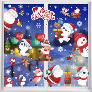 Detailed Christmas window stickers featuring Santa, reindeer, and snowflakes on glass