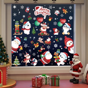 Detailed Christmas window stickers showing Santa and reindeer on glass for home decor