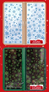 Detailed view of dark blue and lime green snowflake static window stickers for Christmas