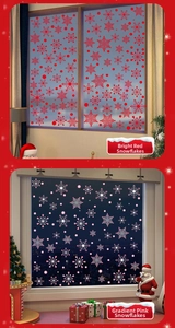 Detail of red and gradient pink snowflake static window stickers for Christmas decor