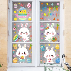 Detail of Easter window stickers with cute cartoon rabbits, eggs, and Happy Easter text