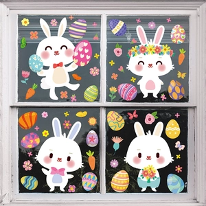 Easter window clings set featuring cartoon bunnies and colorful eggs on glass panes